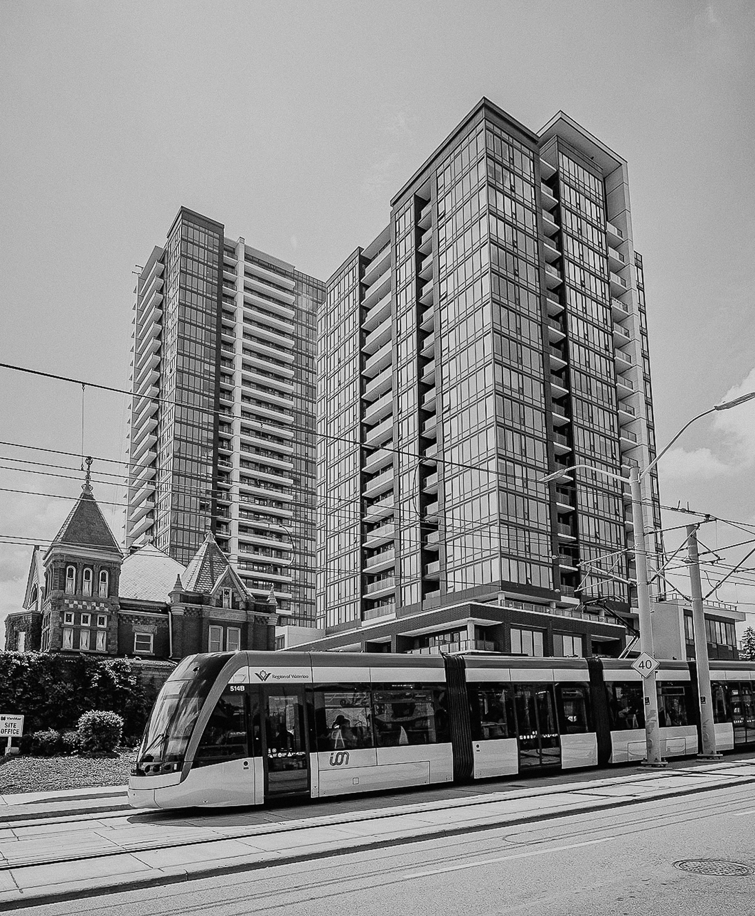 Station Park from street level with an LRT in the foreground
